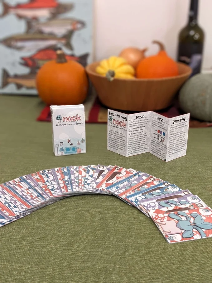 nook's box, rulesheet, and full card spread